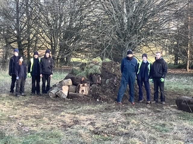 Parks team posing with their new hibernaculum